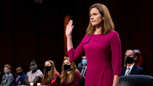 Supreme Court Justice nominee Judge Amy Coney Barrett is sworn in during the Senate Judiciary Committee confirmation hearing for Supreme Court Justice in the Hart Senate Office Building on October 12, 2020 in Washington, DC.