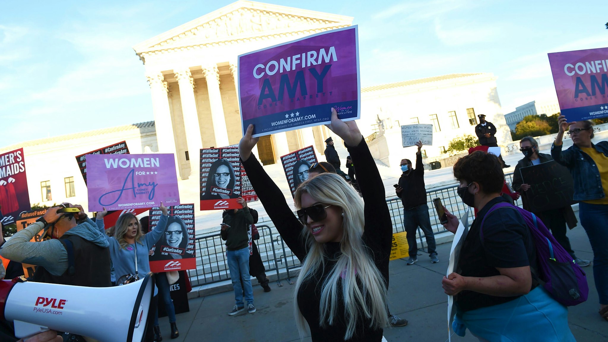 Supporters of Judge Amy Coney Barrett and pro-choice supporters gather outside of the US Supreme Court as the Senate is expected to confirm President Trump's Supreme Court nominee Amy Coney Barrett on Capitol Hill on October 26, 2020 in Washington, DC.