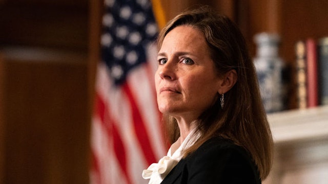 Amy Coney Barrett, U.S. President Donald Trump's nominee for associate justice of the U.S. Supreme Court, meets with Senator Jerry Moran, a Republican from Kansas, not pictured, at the U.S. Capitol in Washington, D.C., U.S., on Thursday, Oct. 1, 2020. A bruising Senate confirmation fight over Trump's Supreme Court choice may seal the fates of several incumbent senators in the November election, though it has yet to drastically alter the odds for which party will control the chamber. Photographer: Anna Moneymaker/The New York Times/Bloomberg