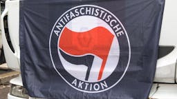 Antifa flag A flag with the anti-fascist symbol is displayed on a truck during the Annual event to celebrate the anniversary of the liberation of Italy from Nazi-Fascism, Milan, Italy, April 25 2019 (Photo by Mairo Cinquetti/NurPhoto via Getty Images)