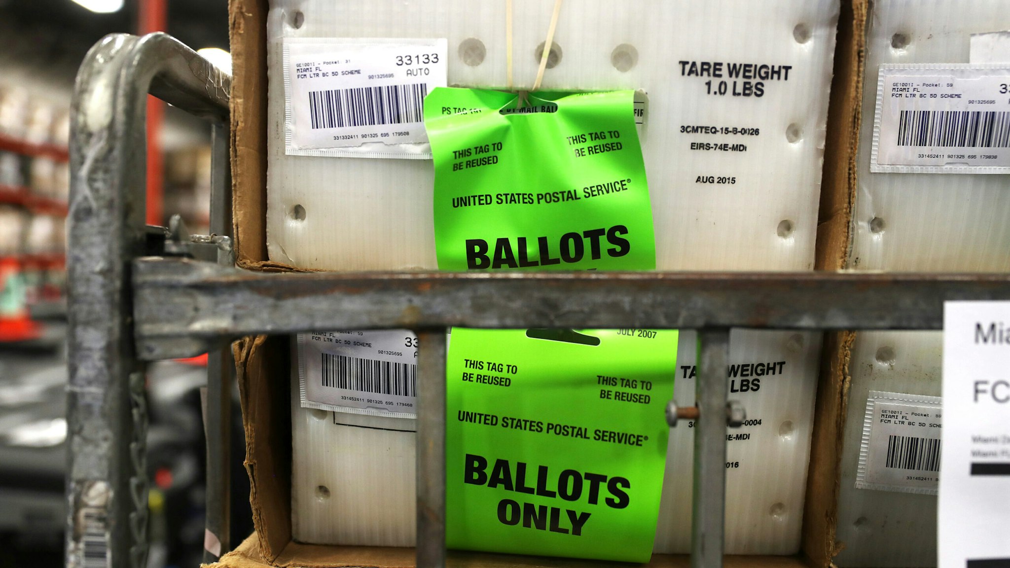 DORAL, FLORIDA - OCTOBER 01: Boxes with ballots are seen at the Miami-Dade County Election Department as the vote-by-mail ballots are placed on to a U.S. Post Office truck to be delivered to voters on October 01, 2020 in Doral, Florida. The Miami-Dade County Elections Department mailed out more than 530,000 vote-by-mail ballots to voters with a request on file for the November 3, 2020 General Election.