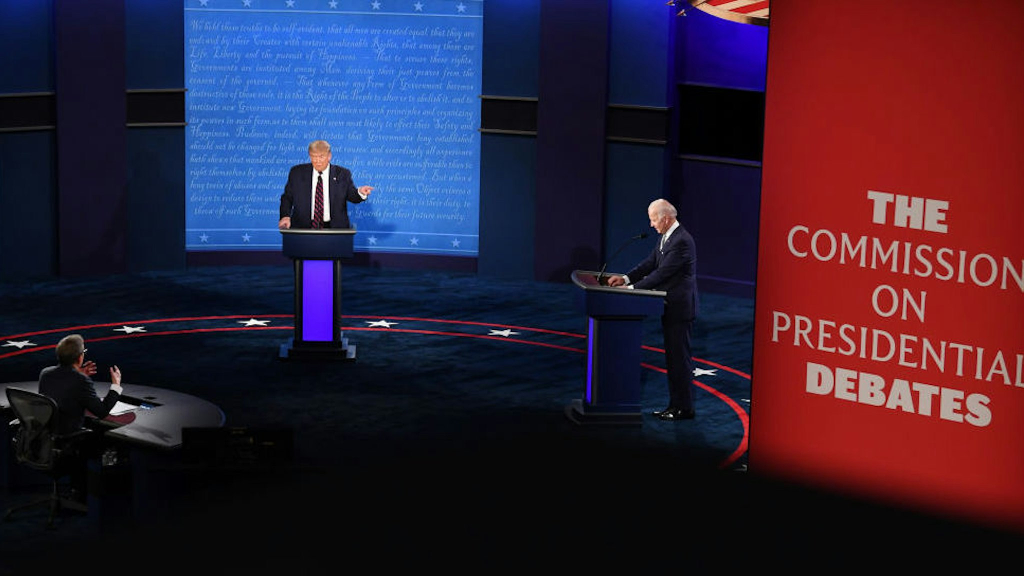 U.S. President Donald Trump, left, speaks as Joe Biden, 2020 Democratic presidential nominee, right, listens during the first U.S. presidential debate hosted by Case Western Reserve University and the Cleveland Clinic in Cleveland, Ohio, U.S., on Tuesday, Sept. 29, 2020. Trump and Biden kick off their first debate with contentious topics like the Supreme Court and the coronavirus pandemic suddenly joined by yet another potentially explosive question -- whether the president ducked paying his taxes.