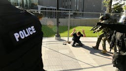 Denver shooting DENVER, COLORADO - OCTOBER 10: Police order a man to the ground after a shooting in Downtown Denver on October 10, 2020 in Denver, Colorado. The shooting happened as opposing rallies by far-right and far-left activists were ending. The shooter has been identified as Matthew Dolloff, center. He is being held for investigation of First Degree Murder in connection with this shooting. (Photo by Helen H. Richardson/MediaNews Group/The Denver Post via Getty Images)