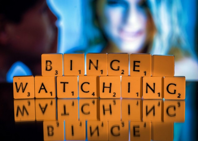 ILLUSTRATION - The English word "binge-watching" spelled out in Scrabble letters in Schwerin, Germany, 5 November 2015. The expression, describing continuous television viewing, was named word of the year by the British Collin's dictionary.