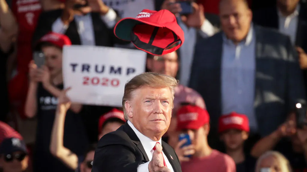 Trump Camp Releases Comical Ad Showing POTUS Tossing ‘MAGA’ Hats At Opponents