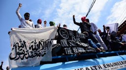 Al-Qaeda flag Kashmiri protesters wave Al-qaeda flags during protests outside Jamia Masjid Srinagar, Indian Administered Kashmir on 31 May 2019.