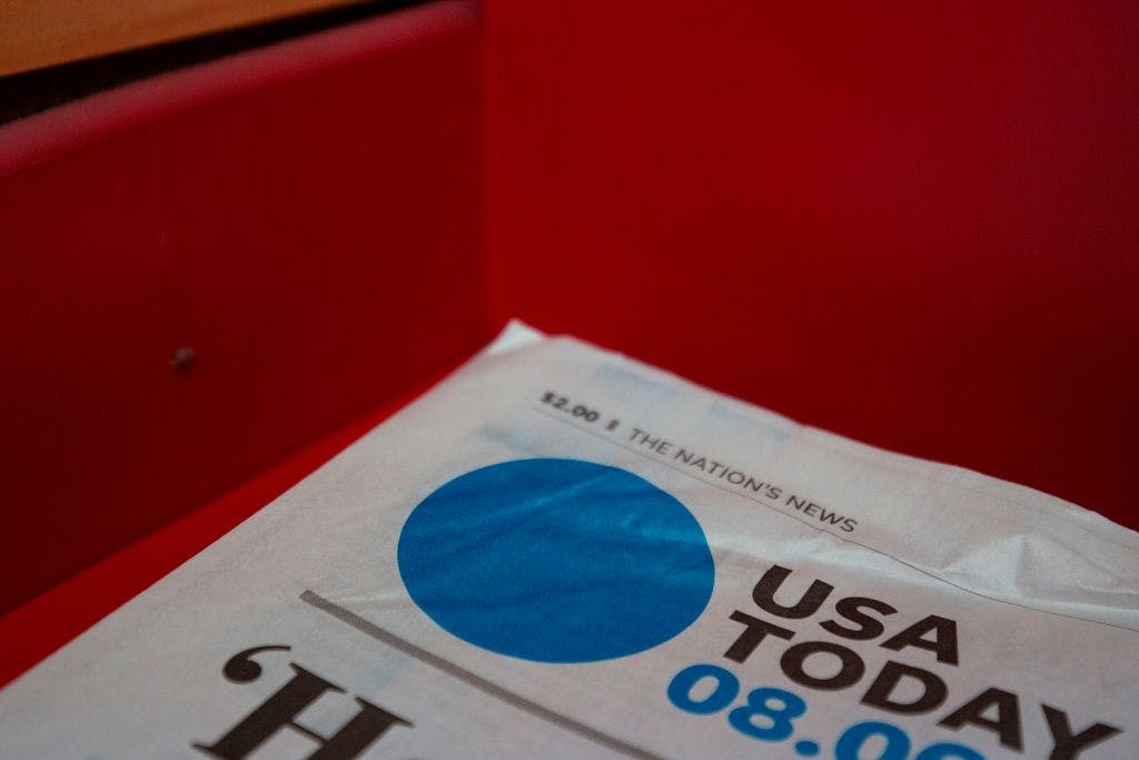 The front page of a USA Today newspaper is seen at a convenience store in Washington, DC, on August 6, 2019.