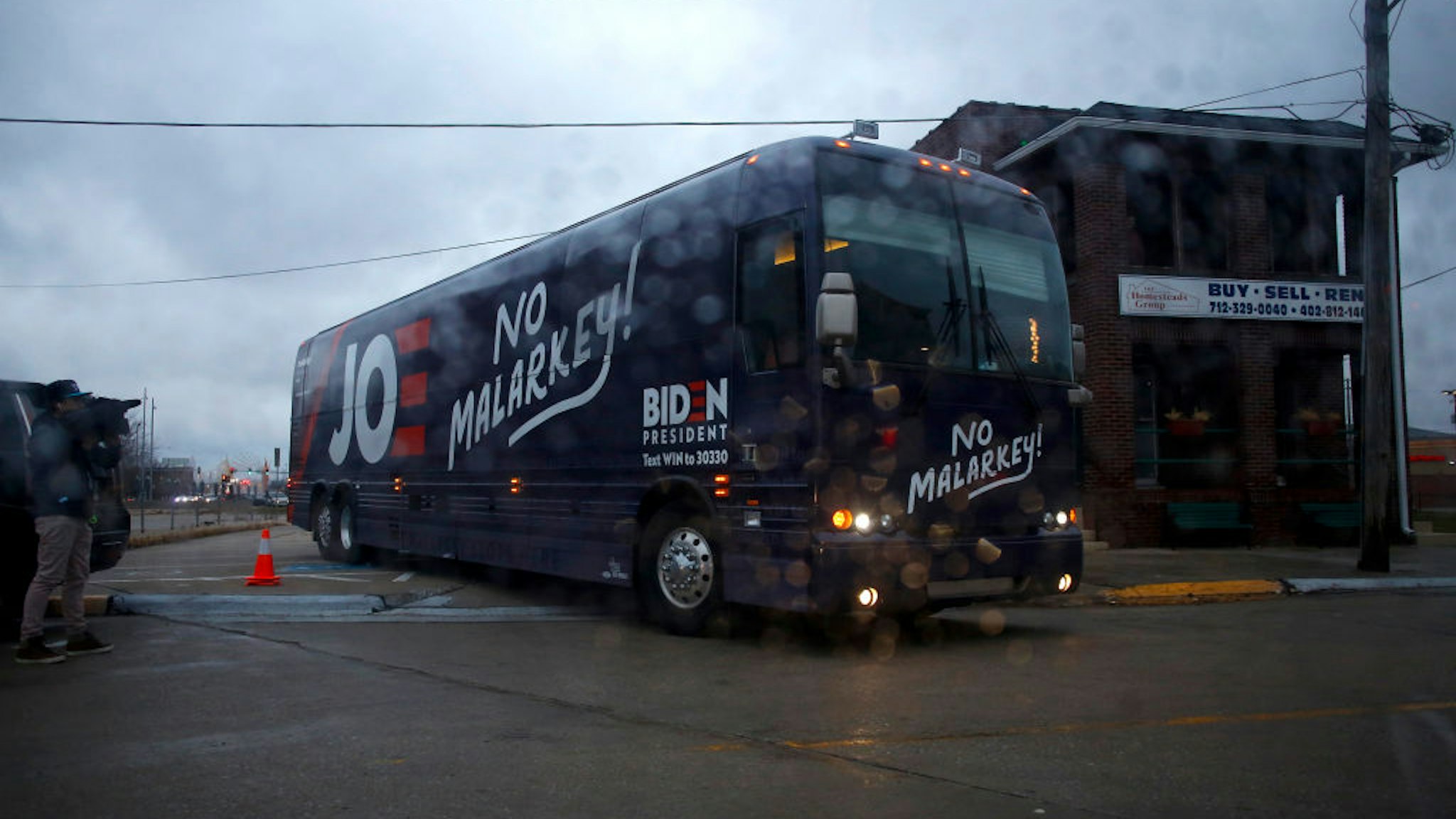 The bus of Democratic presidential candidate, former Vice President Joe Biden exits a parking lot after a campaign event on November 30, 2019 in Council Bluffs, Iowa.