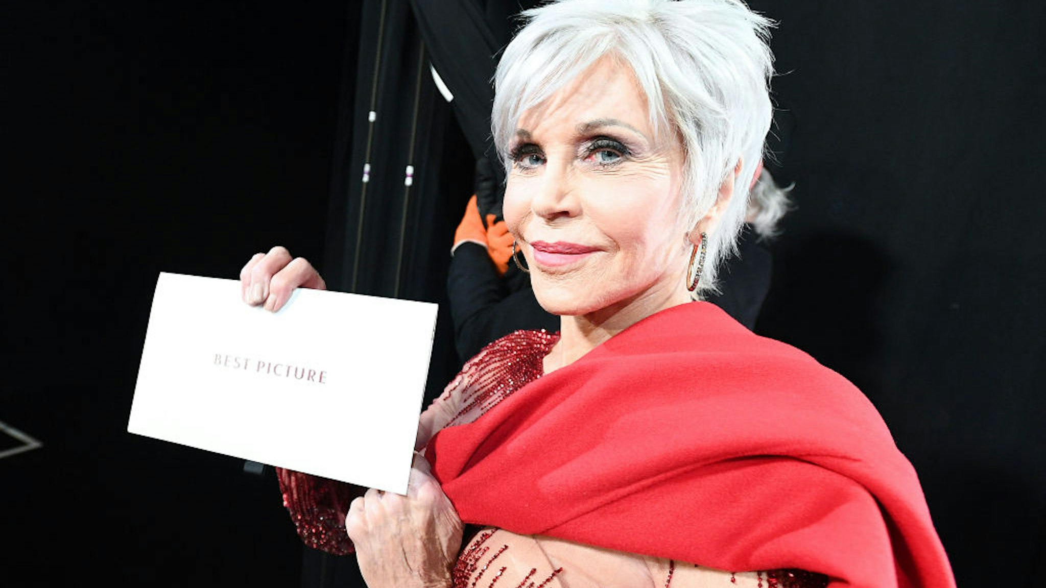 n this handout photo provided by A.M.P.A.S. Jane Fonda poses with the Best Picture envelope backstage during the 92nd Annual Academy Awards at the Dolby Theatre on February 09, 2020 in Hollywood, California.