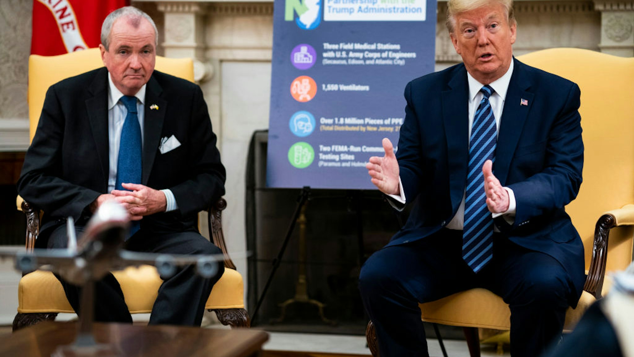 U.S. President Donald Trump meets with New Jersey Gov. Phil Murphy (L) in the Oval Office of the White House April 30, 2020 in Washington, DC.
