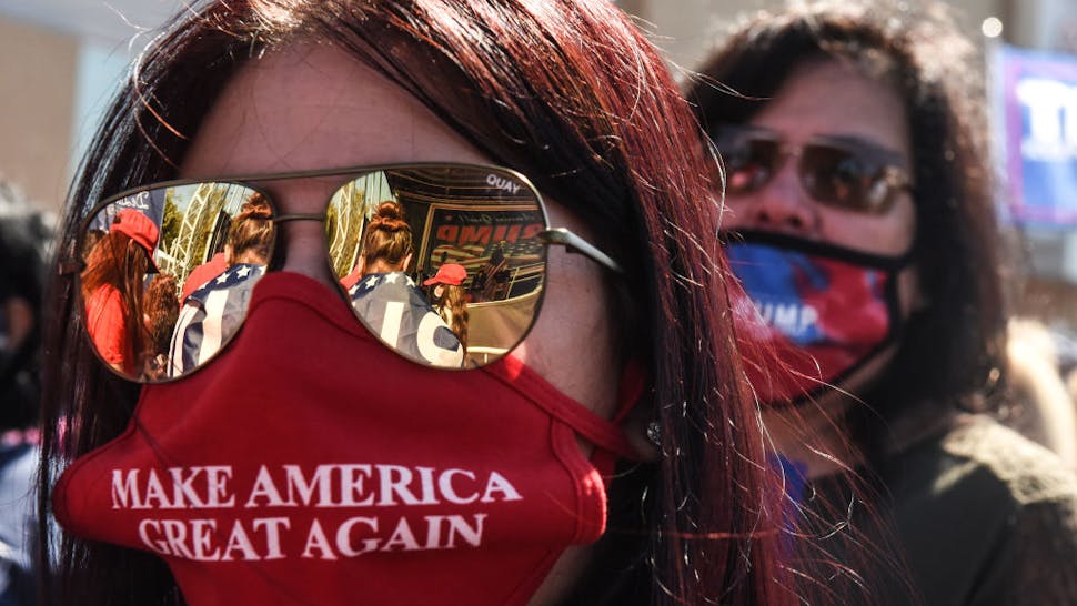 Pro-Trump Rally Held On New York’s Staten Island People hold a pro-Trump rally on October 3, 2020 in the borough of Staten Island in New York City.