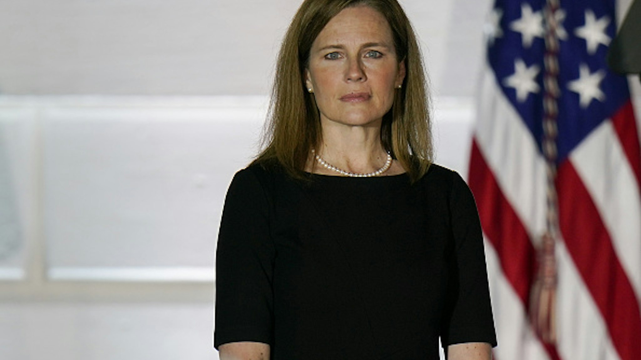 Amy Coney Barrett, associate justice of the U.S. Supreme Court, stands during a ceremony on the South Lawn of the White House in Washington, D.C., U.S., on Monday, Oct. 26, 2020. The Senate voted 52-48 Monday to confirm Barrett to the Supreme Court, giving the court a 6-3 conservative majority that could determine the future of the Affordable Care Act and abortion rights.