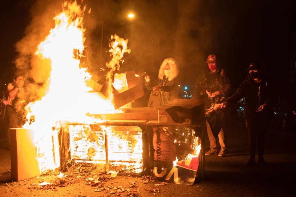 Protesters set a sofa on fire in West Philadelphia on October 27, 2020, during a demonstration against the fatal shooting of 27-year-old Walter Wallace, a Black man, by police.