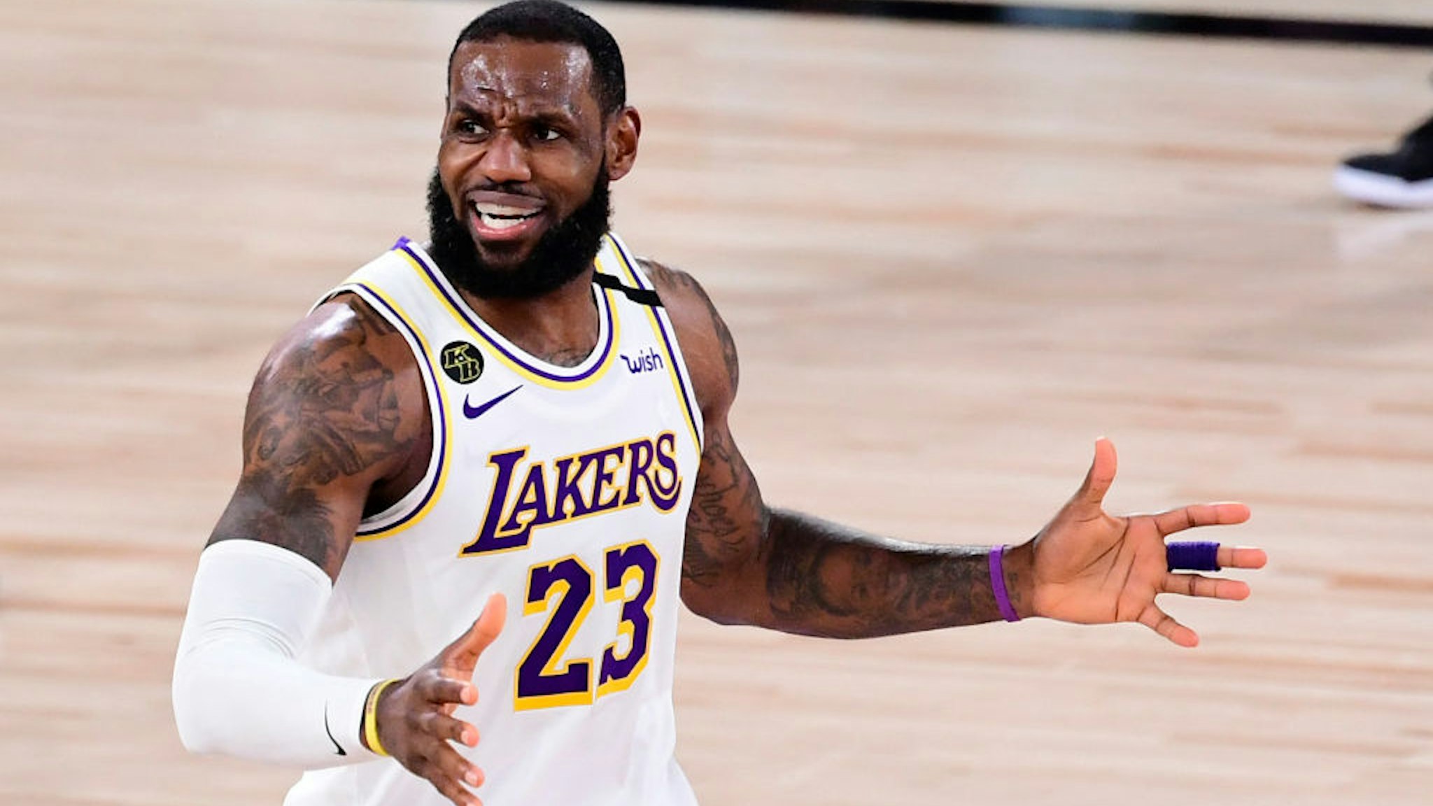 LeBron James #23 of the Los Angeles Lakers reacts to a call during the second half against the Miami Heat in Game Three of the 2020 NBA Finals at AdventHealth Arena at ESPN Wide World Of Sports Complex on October 04, 2020 in Lake Buena Vista, Florida.