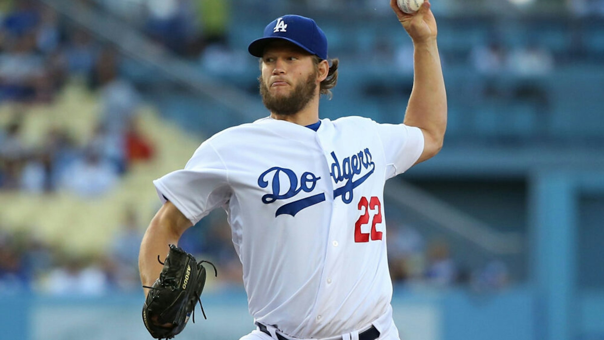 LOS ANGELES, CA - JUNE 18: Pitcher Clayton Kershaw #22 of the Los Angeles Dodgers pitches in the first inning during the MLB game against the Colorado Rockies at Dodger Stadium on June 18, 2014 in Los Angeles, California.