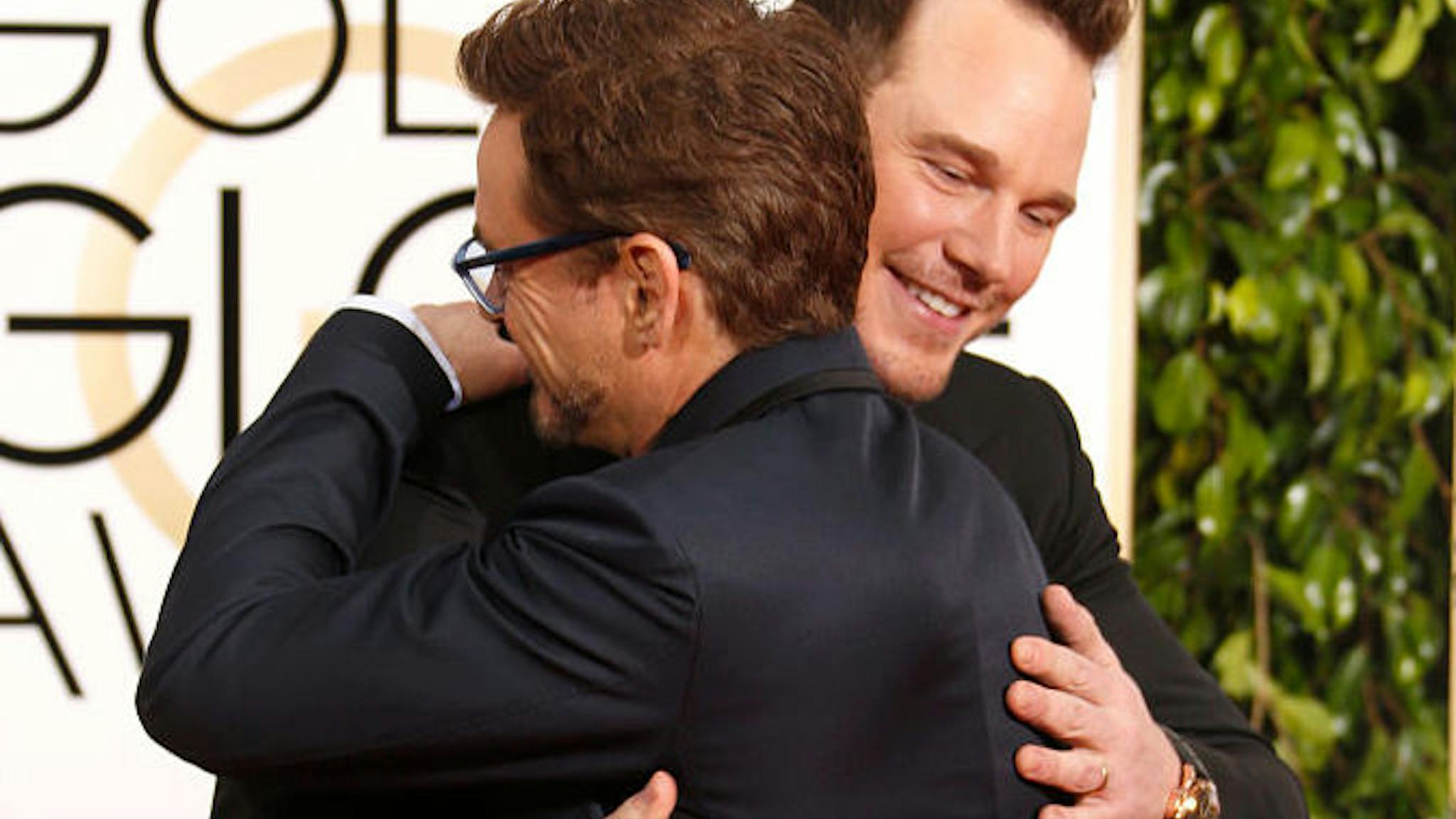 72nd Annual Golden Globe Awards – Arrivals Actors Robert Downey Jr. and Chris Pratt (R) attend the 72nd Annual Golden Globe Awards at The Beverly Hilton Hotel on January 11, 2015 in Beverly Hills, California.