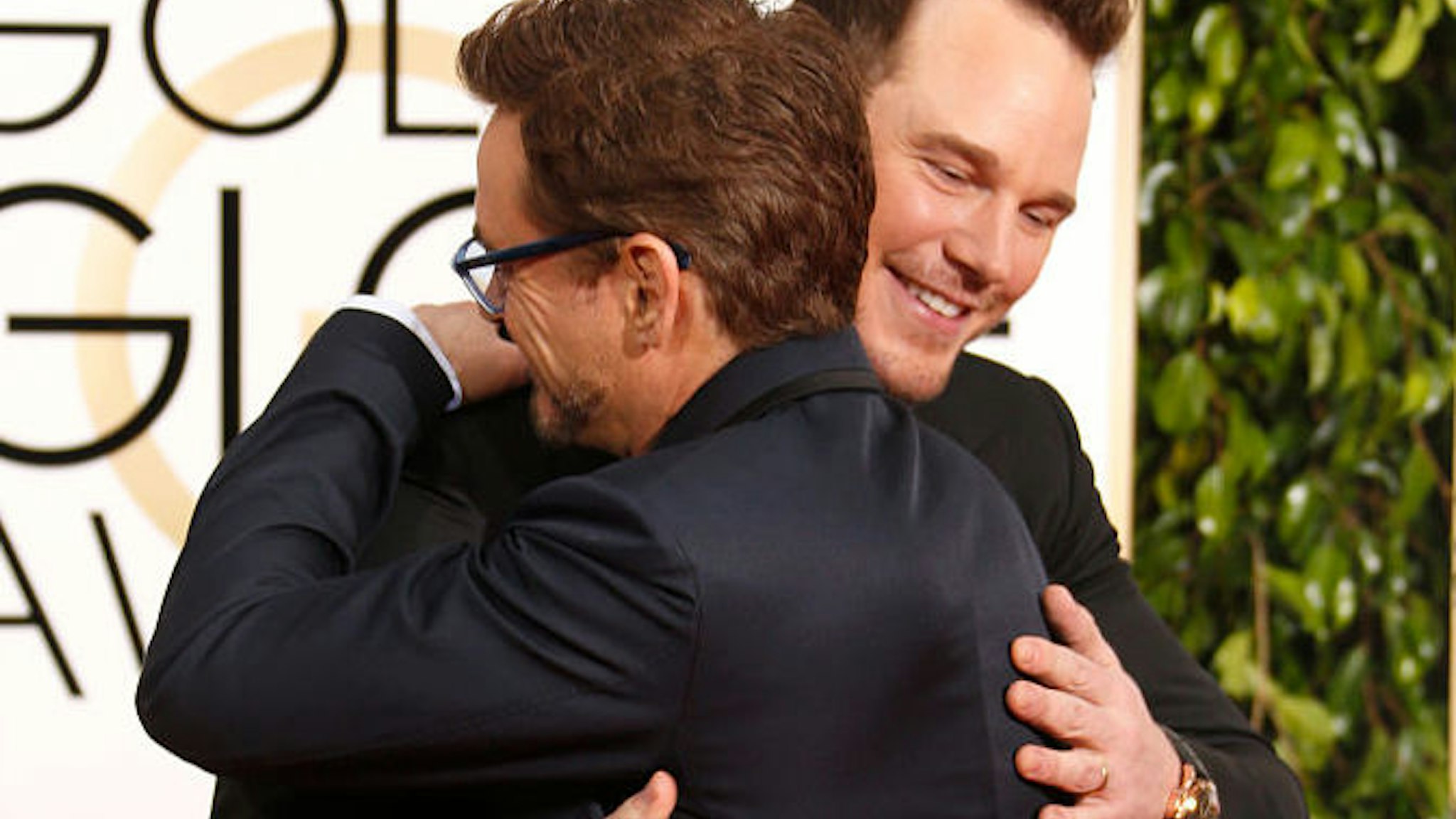 Actors Robert Downey Jr. and Chris Pratt (R) attend the 72nd Annual Golden Globe Awards at The Beverly Hilton Hotel on January 11, 2015 in Beverly Hills, California.