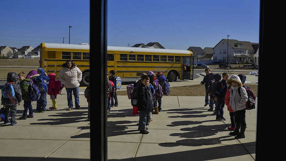 Loudoun county school Kindergarteners prepare to leave Creighton's Corner Elementary School after a half day on Friday, February 28, 2014, in Ashburn, VA.