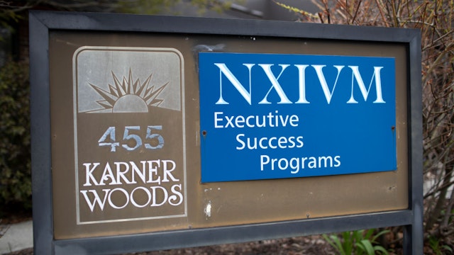 The NXIVM Executive Success Programs sign outside of the office at 455 New Karner Road on April 26, 2018 in Albany, New York.