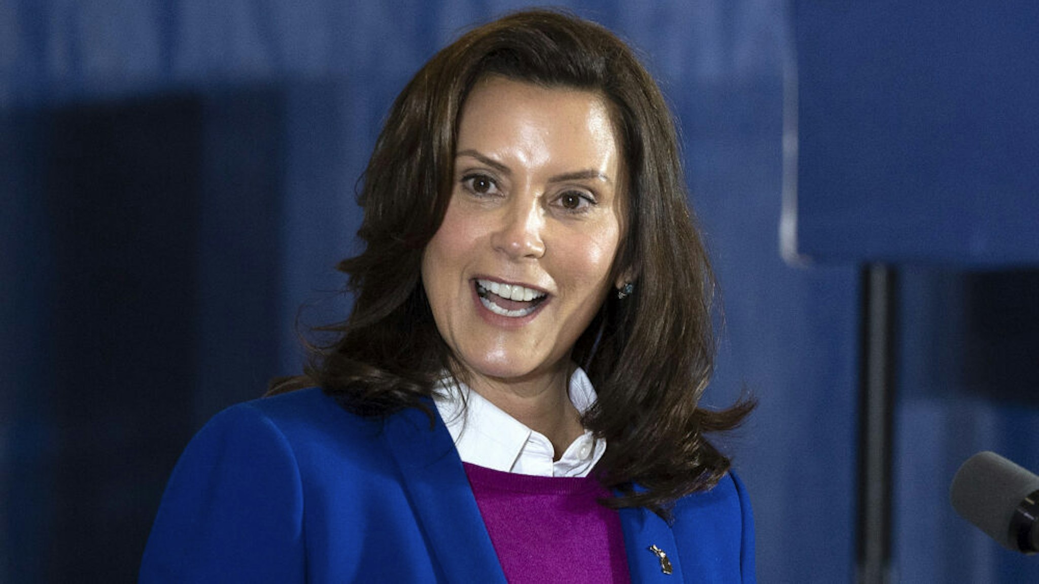 Michigan Governor Gretchen Whitmer introduces Democratic Presidential Candidate Joe Biden to speak at Beech Woods Recreation Center in Southfield, Michigan, on October 16, 2020. - Joe Biden on October 16, 2020 described President Donald Trump's reluctance to denounce white supremacists as "stunning" in a hard-hitting speech in battleground Michigan with 18 days to go until the election.