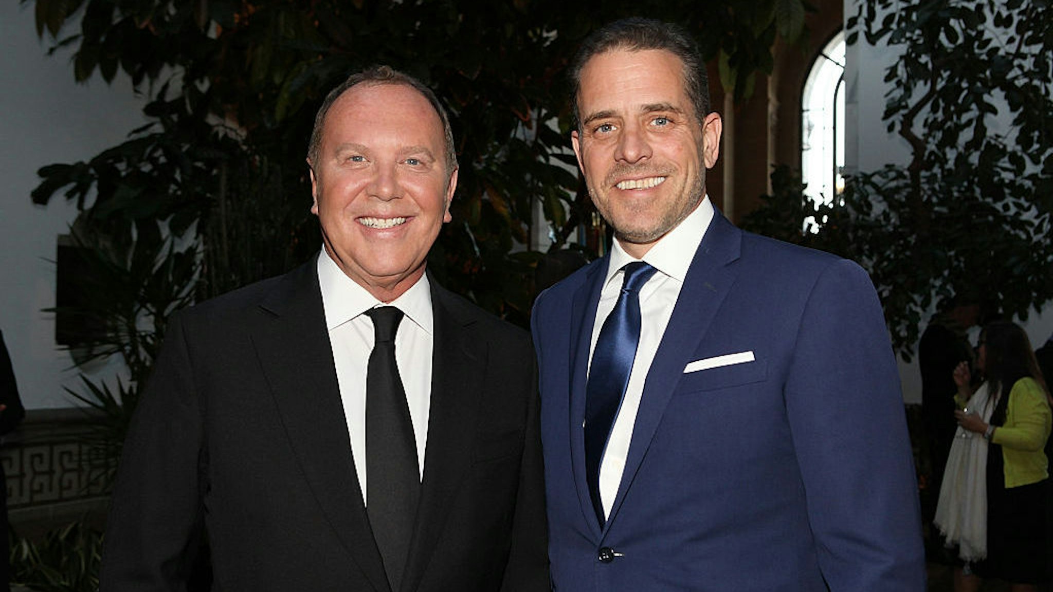 WASHINGTON, DC - APRIL 12: Designer Michael Kors (L) and World Food Program USA Board Chairman Hunter Biden attend the World Food Program USA's Annual McGovern-Dole Leadership Award Ceremony at Organization of American States on April 12, 2016 in Washington, DC. (Photo by Teresa Kroeger/Getty Images for World Food Program USA)