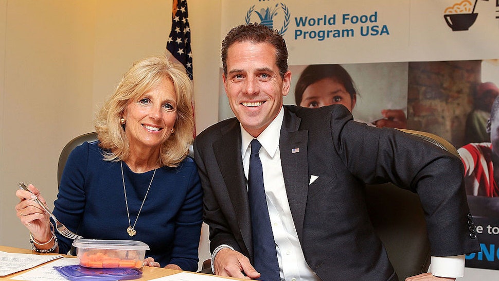 WASHINGTON, DC - MAY 01: Second Lady Dr. Jill Biden and World Food Program USA Board Chair Hunter Biden taking the Live Below the Line Challenge, eating and drinking on $1.50 a day to raise awareness of global hunger and World Food Programme school feeding efforts around the world, at World Food Program USA on May 1, 2013 in Washington, DC. (Photo by Paul Morigi/WireImage)