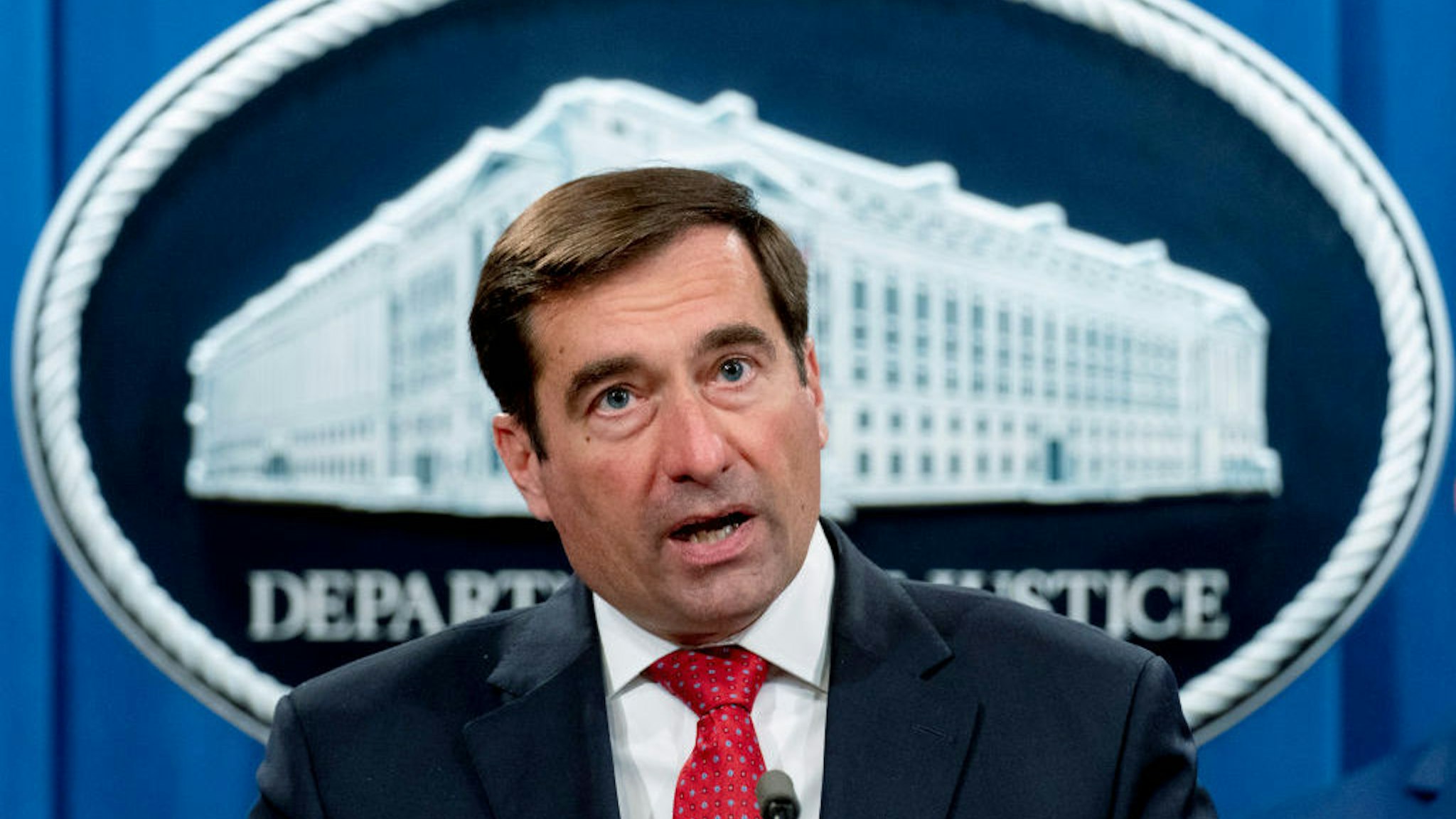 Assistant Attorney General for the National Security Division John Demers speaks at a news conference at the Department of Justice, Monday, Oct. 19, 2020, in Washington. (AP Photo/Andrew Harnik, pool)