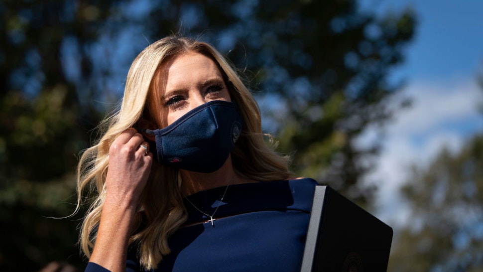 WASHINGTON, DC - OCTOBER 02: White House Press Secretary Kayleigh McEnany arrives to speak with reporters outside the West Wing of the White House on October 2, 2020 in Washington, DC. President Donald Trump and First Lady Melania Trump have both tested positive for coronavirus. (Photo by Drew Angerer/Getty Images)