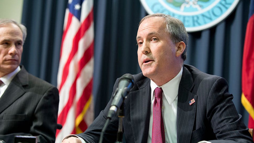Ken Paxton Texas Attorney General Ken Paxton holds a joint press conference Feb. 18, 2015 with Texas Gov. Greg Abbott, l, to address a Texas federal court's decision on the lawsuit filed by 26 states challenging President Obama's executive action on immigration. Paxton was indicted Aug. 3, 2015 on three counts of securities fraud not related to his official duties. (Photo by Robert Daemmrich Photography Inc/Corbis via Getty Images)