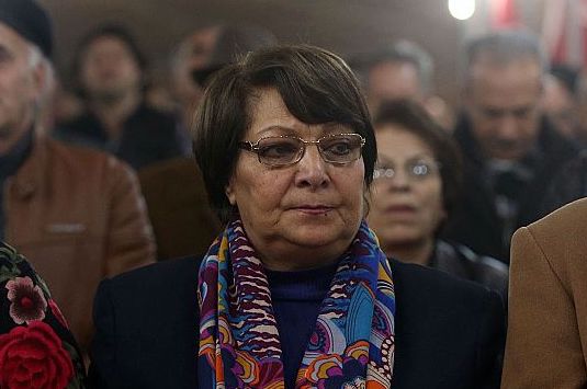 Leila Khaled, a member of the Popular Front for the Liberation of Palestine, attends a ceremony held to commemorate the 2nd Anniversary of Hugo Chavez's Death in Amman, Jordan on March 19, 2015. (Photo by Salah Malkawi/Anadolu Agency/Getty Images)