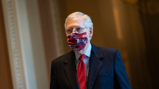 Congress Works To Pass Second COVID-19 Economic Relief Bill WASHINGTON, DC - JULY 30: Senate Majority Leader Mitch McConnell (R-KY) walks to the Senate floor at the U.S. Capitol on July 30, 2020 in Washington, DC. Republicans and Democrats in the Senate remain in a stalemate as the the $600-per-week federal unemployment benefit in place due to the coronavirus pandemic is set to expire on Friday.