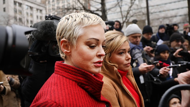 NEW YORK, NEW YORK - JANUARY 06: Actress Rose McGowan, who accused Weinstein of raping her more two two decades ago and then of destroying her career, joins other accusers and protesters as Harvey Weinstein arrives at a Manhattan court house for the start of his trial on January 06, 2020 in New York City. Weinstein, a movie producer whose alleged sexual misconduct helped spark the #MeToo movement, pleaded not-guilty on five counts of rape and sexual assault against two unnamed women and faces a possible life sentence in prison.