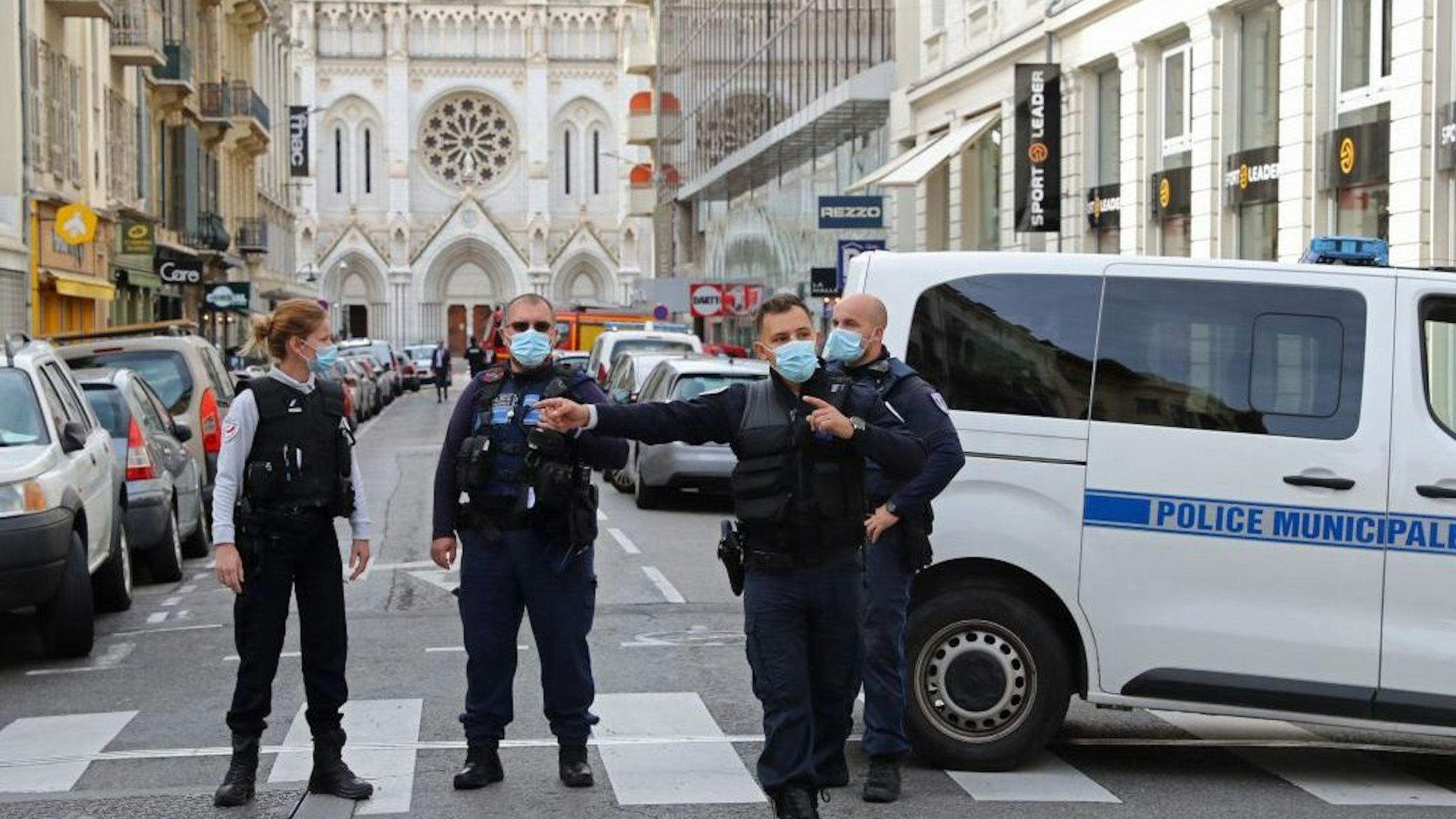 French policemen stand guard the street leading to the Basilica of Notre-Dame de Nice after a knife attack in Nice on October 29, 2020. - France's national anti-terror prosecutors said Thursday they have opened a murder inquiry after a man killed three people at a basilica in central Nice and wounded several others. The city's mayor, Christian Estrosi, told journalists at the scene that the assailant, detained shortly afterwards by police, "kept repeating 'Allahu Akbar' (God is Greater) even while under medication." He added that President Emmanuel Macron would be arriving shortly in Nice. (Photo by Valery HACHE / AFP) (Photo by VALERY HACHE/AFP via Getty Images)