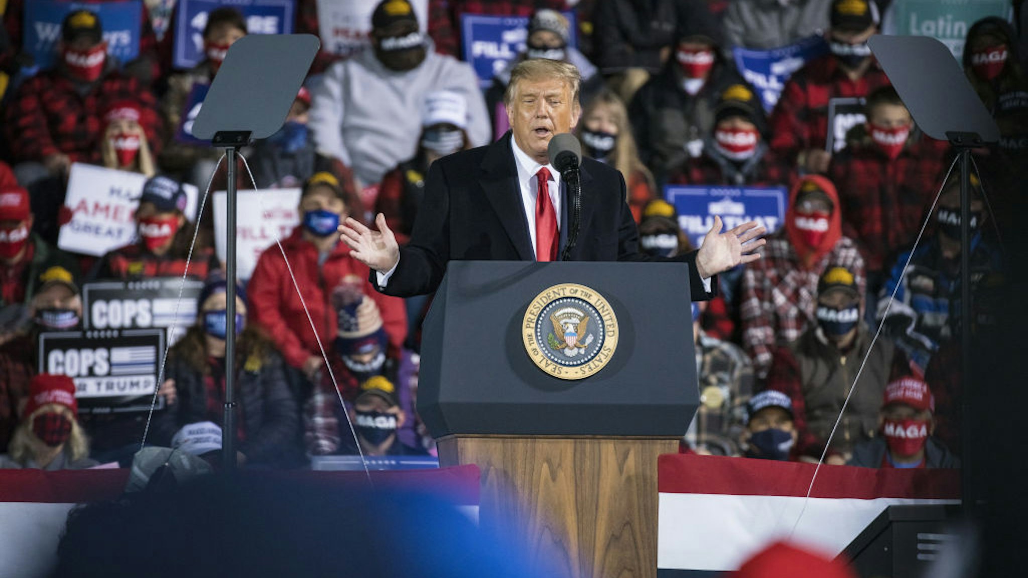 U.S. President Donald Trump speaks during a 'Make America Great Again' rally in Duluth, Minnesota, U.S., on Wednesday, Sept. 30, 2020. Trump signed an executive order aimed at expanding domestic production of rare-earth minerals vital to most manufacturing sectors and reducing dependence on China. Photographer: Ben Brewer/Bloomberg via Getty Images