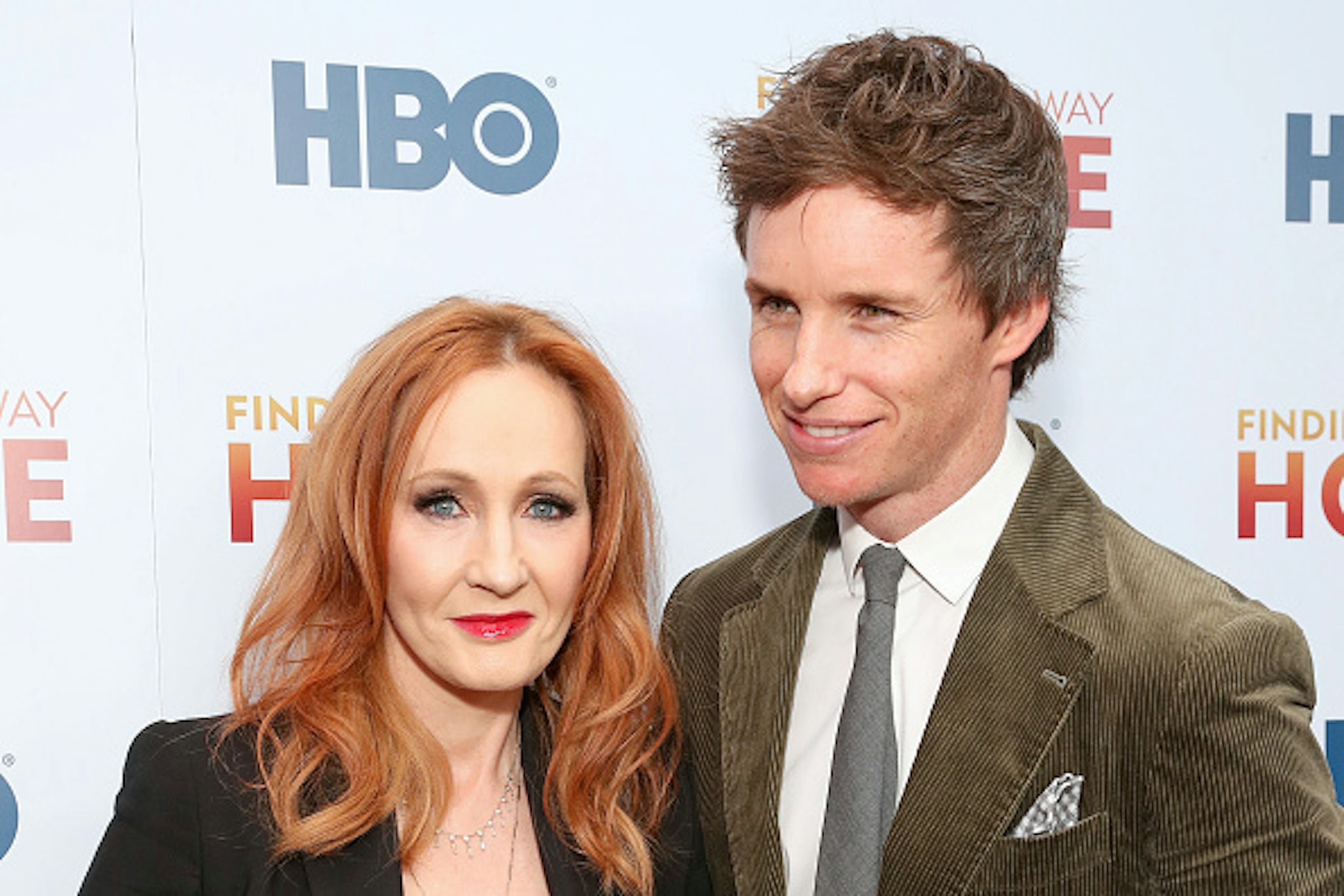 NEW YORK, NEW YORK - DECEMBER 11: J.K. Rowling and Eddie Redmayne attend HBO's "Finding The Way Home" World Premiere at Hudson Yards on December 11, 2019 in New York City.
