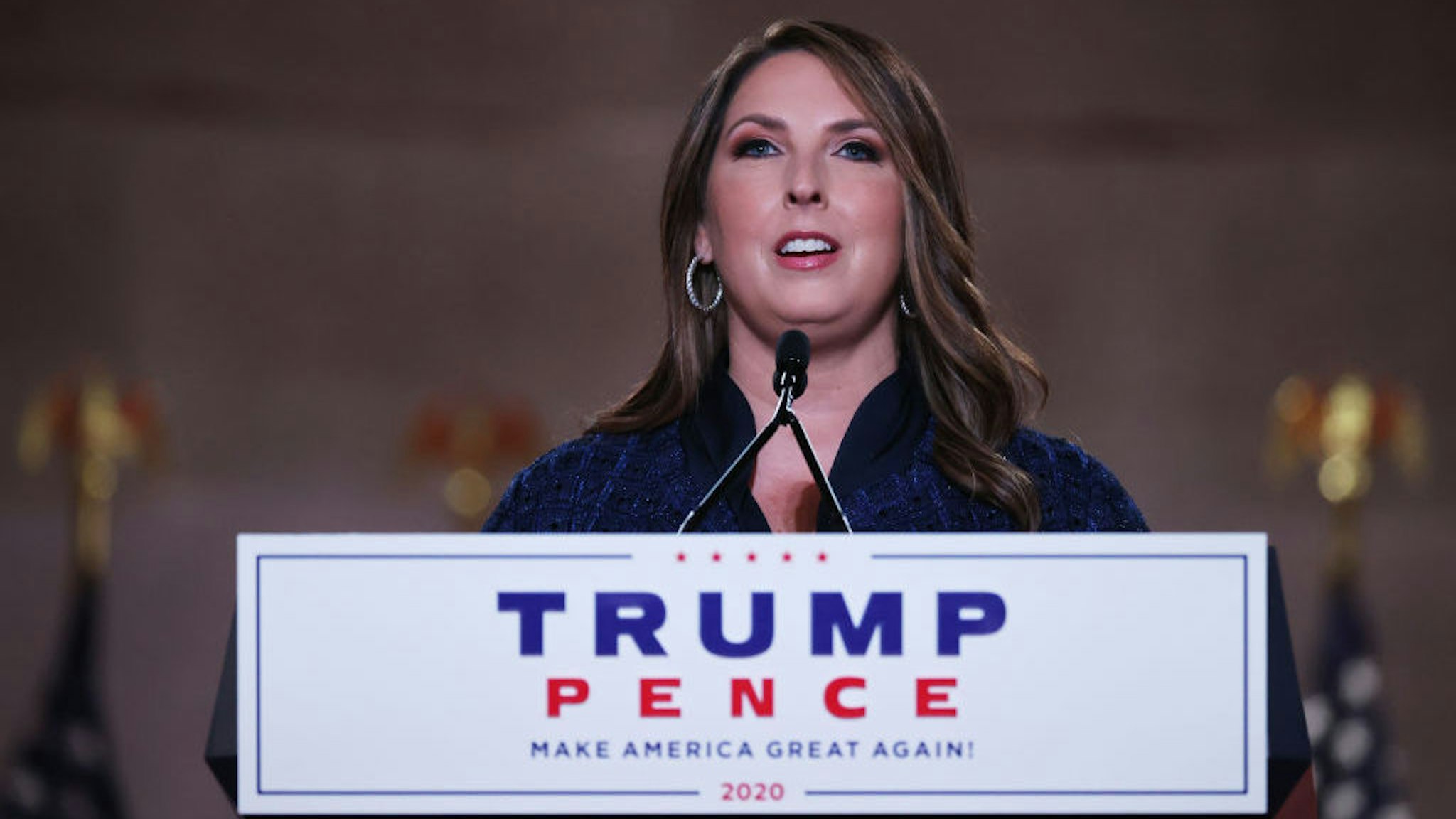 WASHINGTON, DC - AUGUST 24: Chair of the Republican National Committee Ronna McDaniel stands on stage in an empty Mellon Auditorium while addressing the Republican National Convention at the Mellon Auditorium on August 24, 2020 in Washington, DC. The novel coronavirus pandemic has forced the Republican Party to move away from an in-person convention to a televised format, similar to the Democratic Party's convention a week earlier. (Photo by Chip Somodevilla/Getty Images)