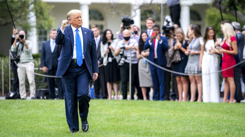 President Donald J. Trump walks across the South Lawn of the White House Thursday, Sept. 24, 2020, to board Marine One en route to Joint Base Andrews, Md. to begin his trip to North Carolina and Florida.