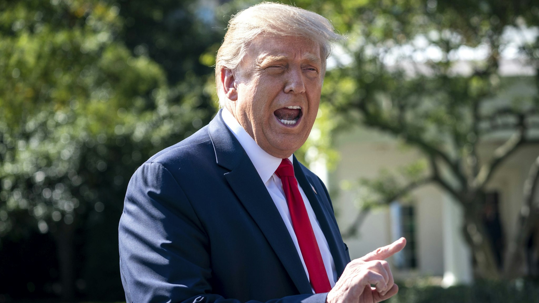WASHINGTON, DC - SEPTEMBER 30: U.S. President Donald Trump speaks to reporters on his way to Marine One on the South Lawn of the White House on September 30, 2020 in Washington, DC. President Trump is traveling to Minnesota for a fundraising event and a campaign rally.