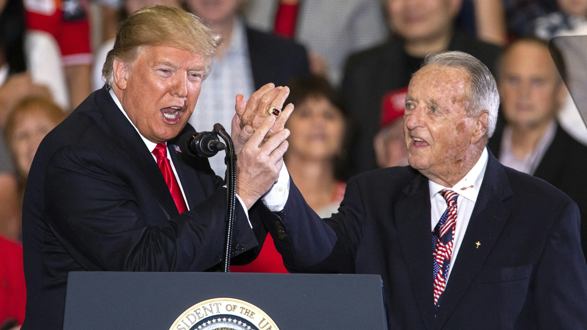 PENSACOLA, FL - NOVEMBER 03: Legendary Florida State University head football coach Bobby Bowden is introduced by U.S. President Donald Trump at a campaign rally at the Pensacola International Airport on November 3, 2018 in Pensacola, Florida. President Trump is campaigning in support of Republican candidates in the upcoming midterm elections.