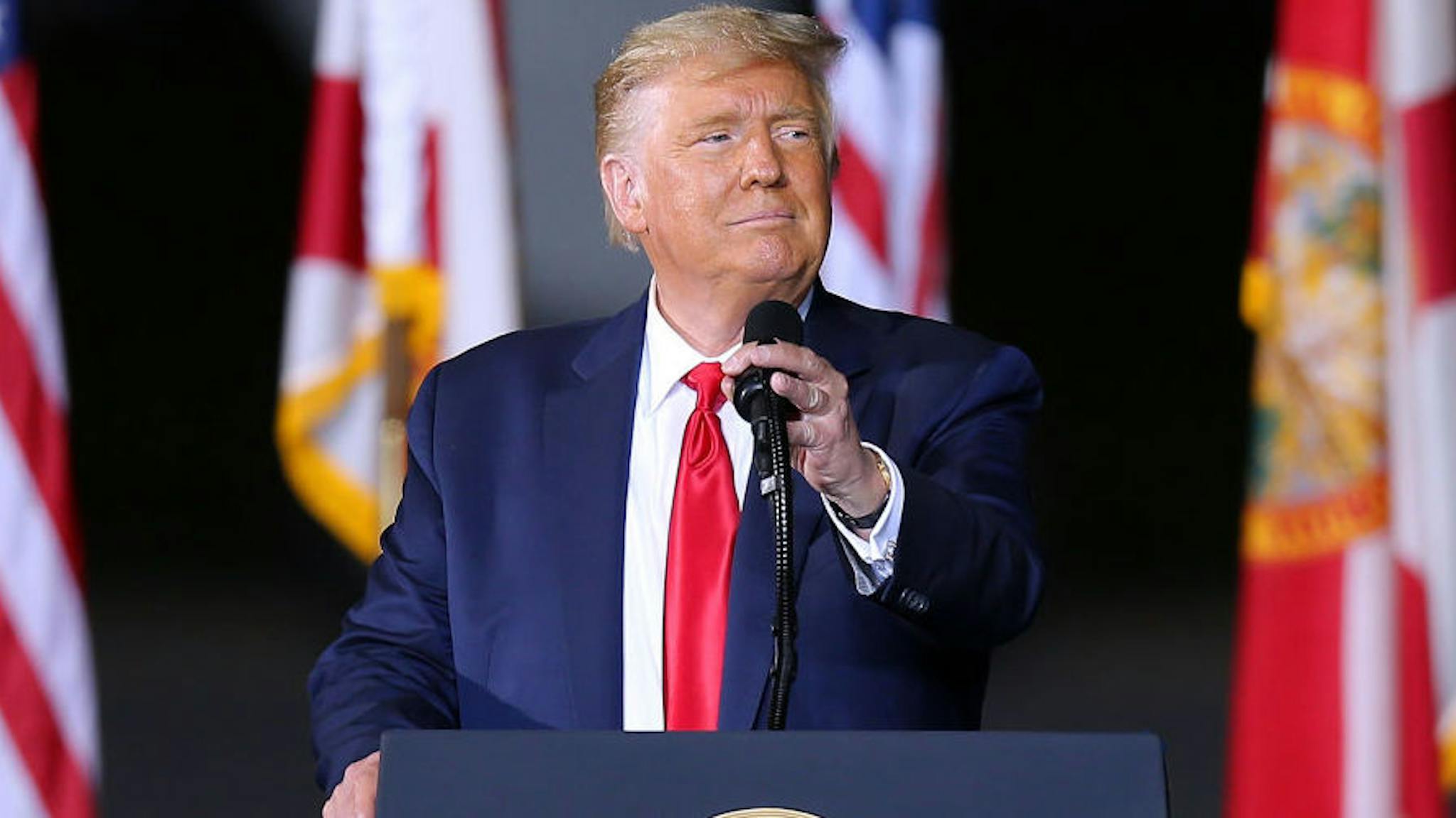President Trump Holds Two Campaign Rallies In Florida PENSACOLA, FL - OCTOBER 23: President Donald Trump speaks during a rally on October 23, 2020 in Pensacola, Florida. With less than two weeks before the general election, President Trump looks to close the gap between him and Democratic presidential candidate former Vice President Joe Biden.