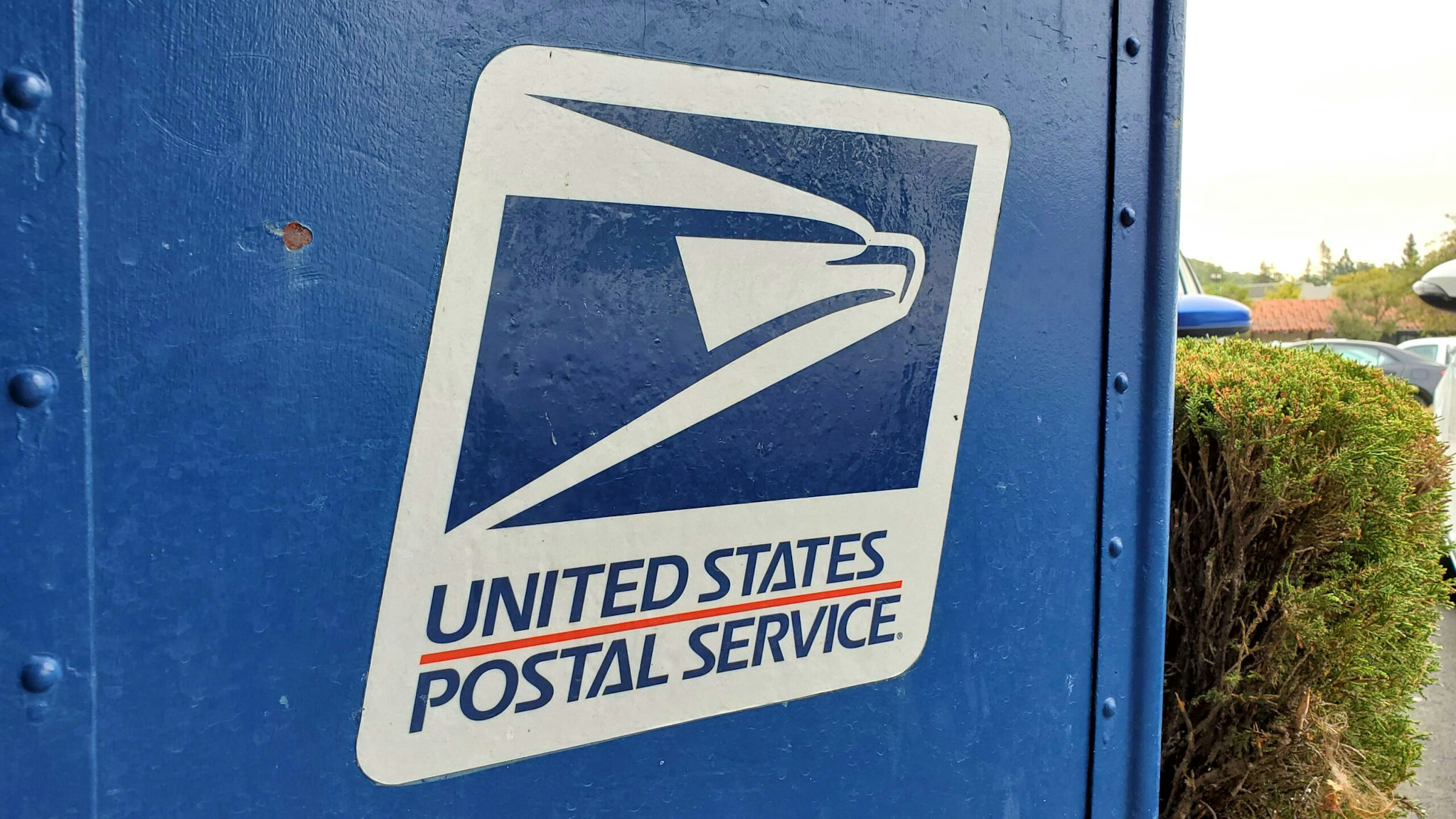 Close-up of logo for United States Postal Service (USPS) on mailbox in Lafayette, California, September 3, 2020.