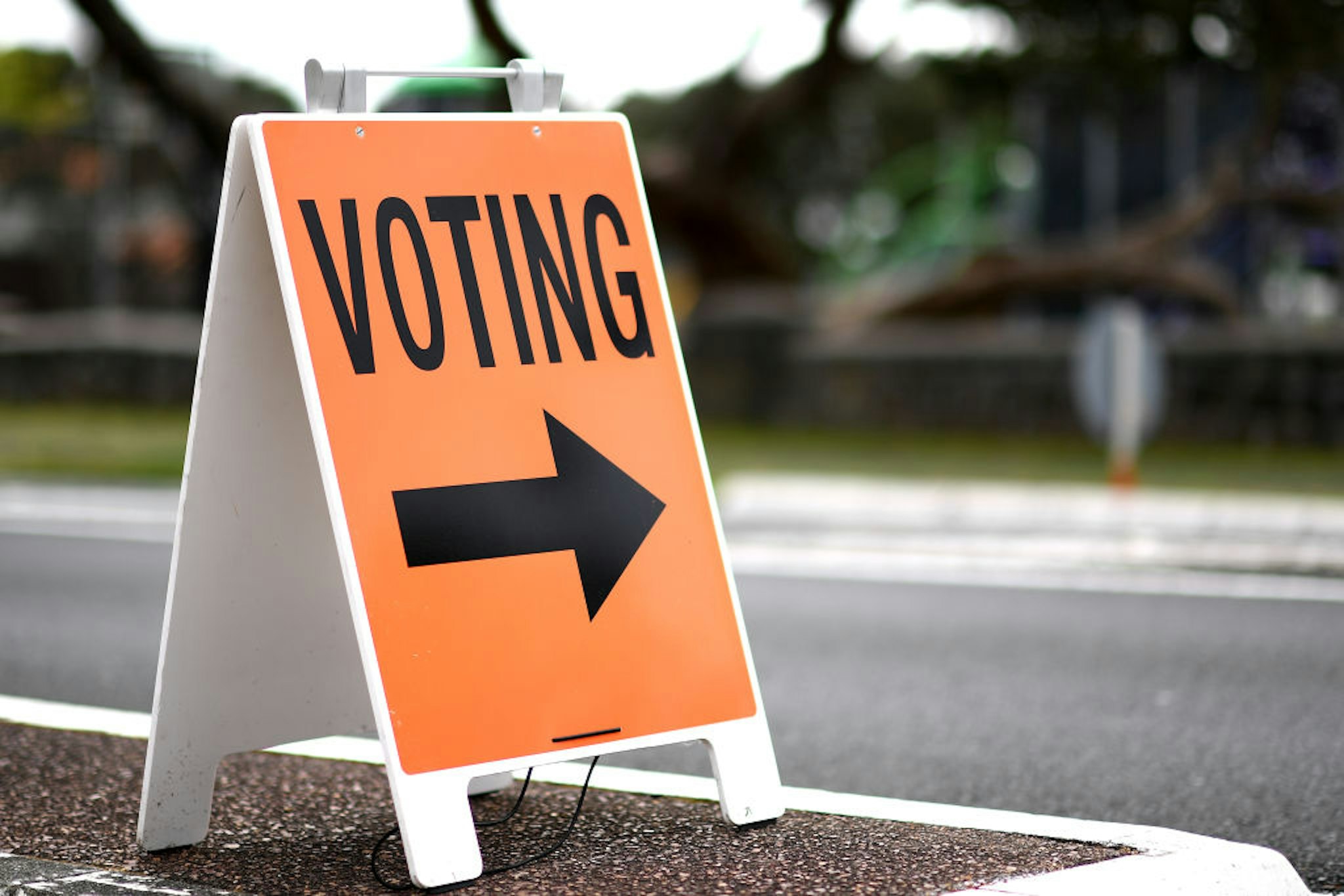 Signage for advance voting is displayed outside a polling booth on October 09, 2020 in Auckland, New Zealand. New Zealanders have been able to cast their votes in advance since October 3 ahead of the 2020 General Election. The 2020 New Zealand General Election was originally due to be held on Saturday 19 September but was delayed due to the re-emergence of COVID-19 in the community. (Photo by Hannah Peters/Getty Images)