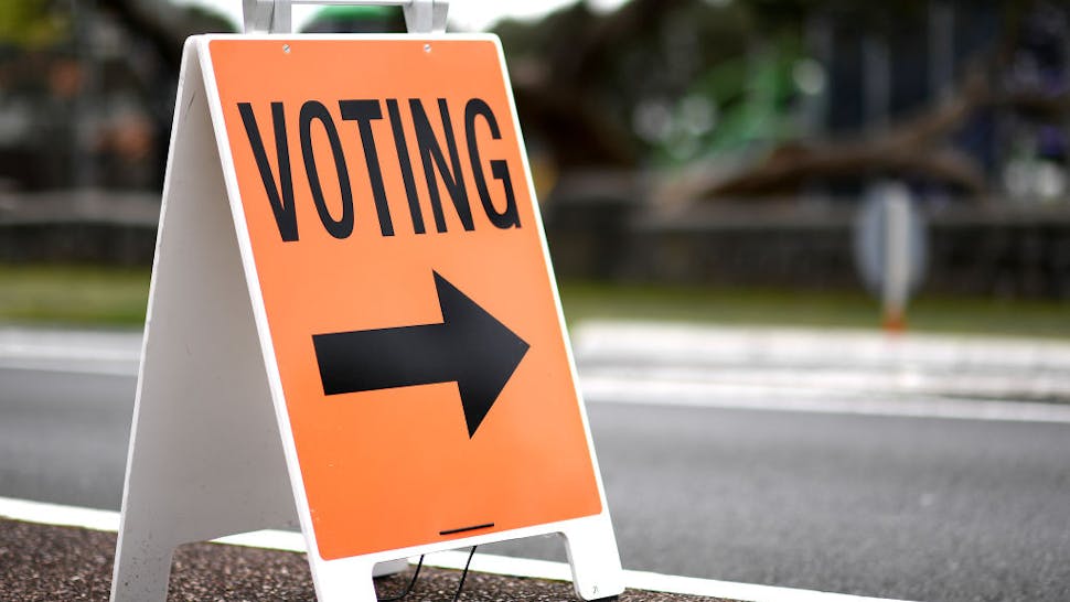 Voting Signage for advance voting is displayed outside a polling booth on October 09, 2020 in Auckland, New Zealand. New Zealanders have been able to cast their votes in advance since October 3 ahead of the 2020 General Election. The 2020 New Zealand General Election was originally due to be held on Saturday 19 September but was delayed due to the re-emergence of COVID-19 in the community. (Photo by Hannah Peters/Getty Images)