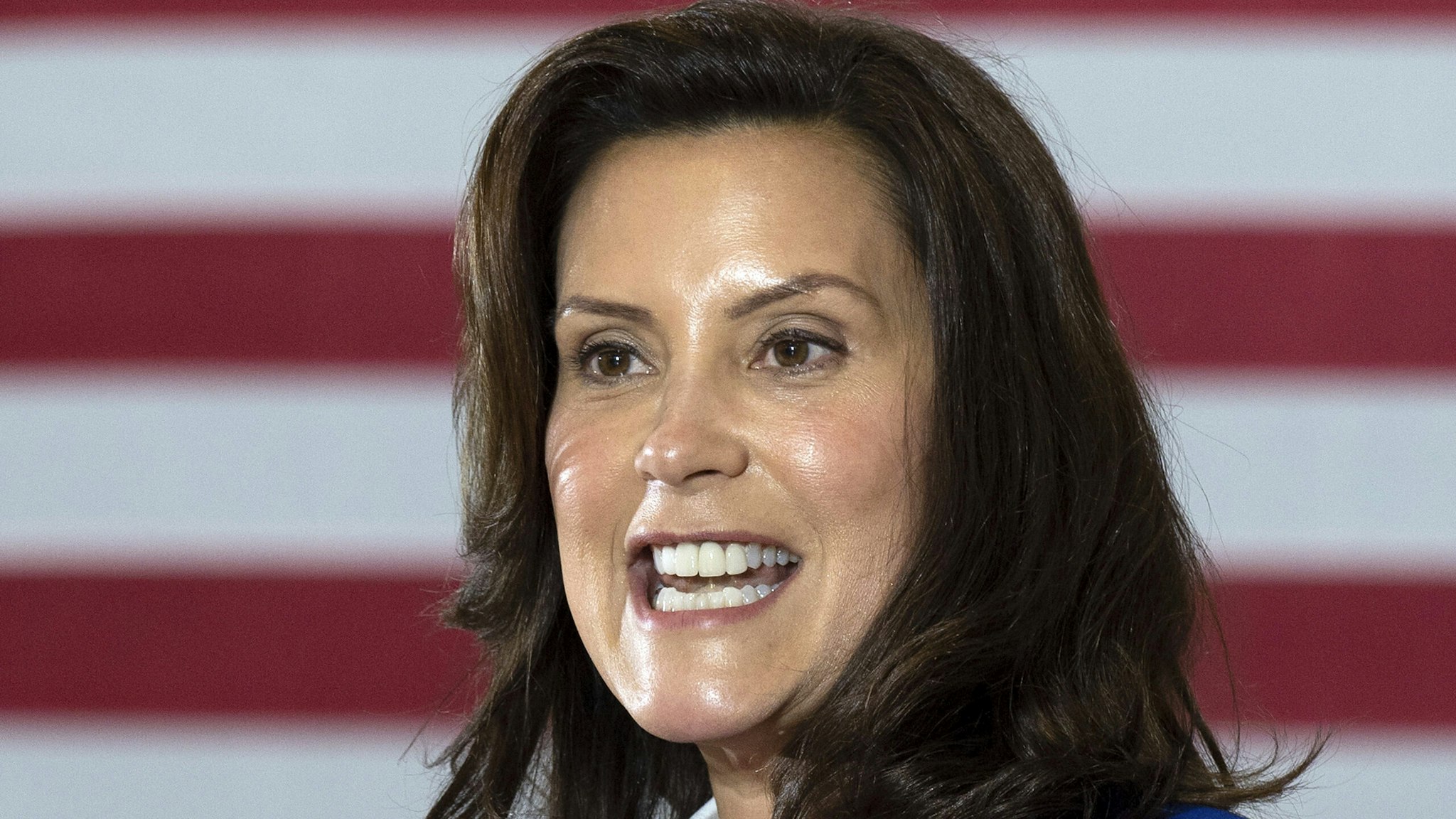 Michigan Governor Gretchen Whitmer introduces Democratic Presidential Candidate Joe Biden to speak at Beech Woods Recreation Center in Southfield, Michigan, on October 16, 2020. - Joe Biden on October 16, 2020 described President Donald Trump's reluctance to denounce white supremacists as "stunning" in a hard-hitting speech in battleground Michigan with 18 days to go until the election.
