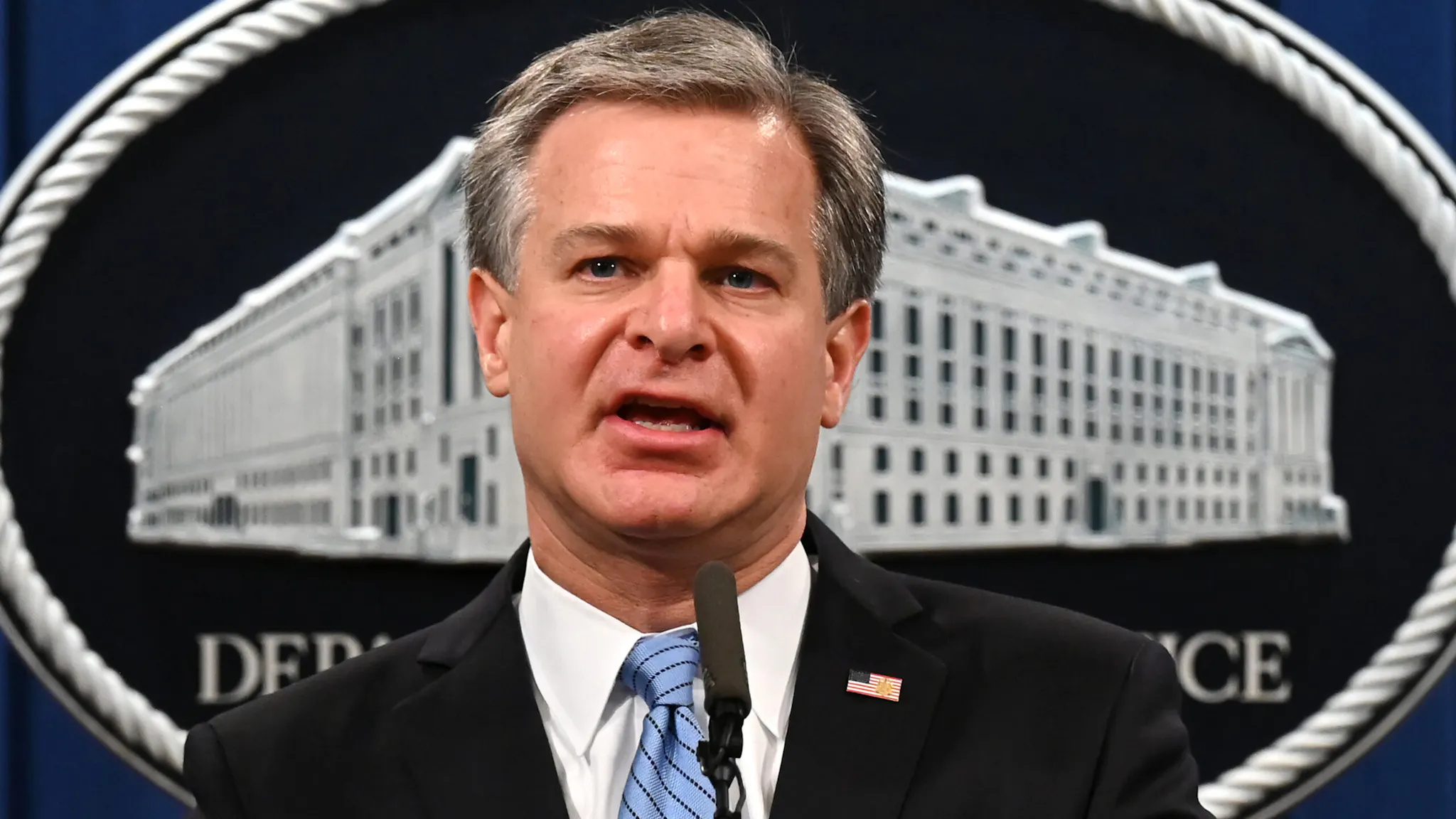 Department Of Justice Holds News Conference On National Security Christopher Wray, director of the Federal Bureau of Investigation (FBI), speaks during a news conference at the Department of Justice in Washington, D.C., U.S., on Wednesday, Oct. 7, 2020. U.S. authorities announced two Islamic State militants, tied to beheadings and other acts of violence against Western hostages including four Americans, will face trial in federal court in the Eastern District of Virginia.