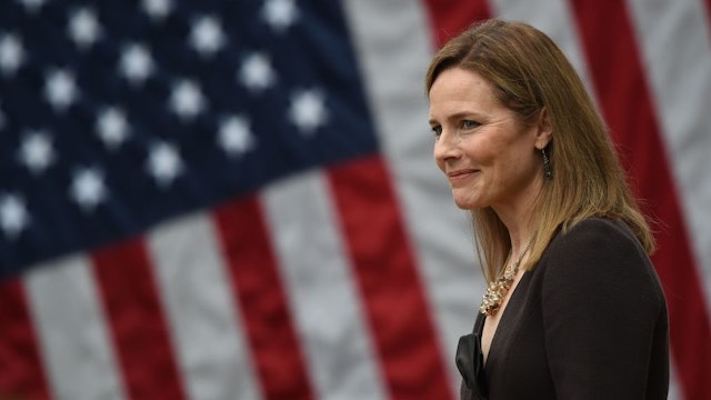 TOPSHOT - Judge Amy Coney Barrett is nominated to the US Supreme Court by President Donald Trump in the Rose Garden of the White House in Washington, DC on September 26, 2020. - Barrett, if confirmed by the US Senate, will replace Justice Ruth Bader Ginsburg, who died on September 18. (Photo by Olivier DOULIERY / AFP) (Photo by