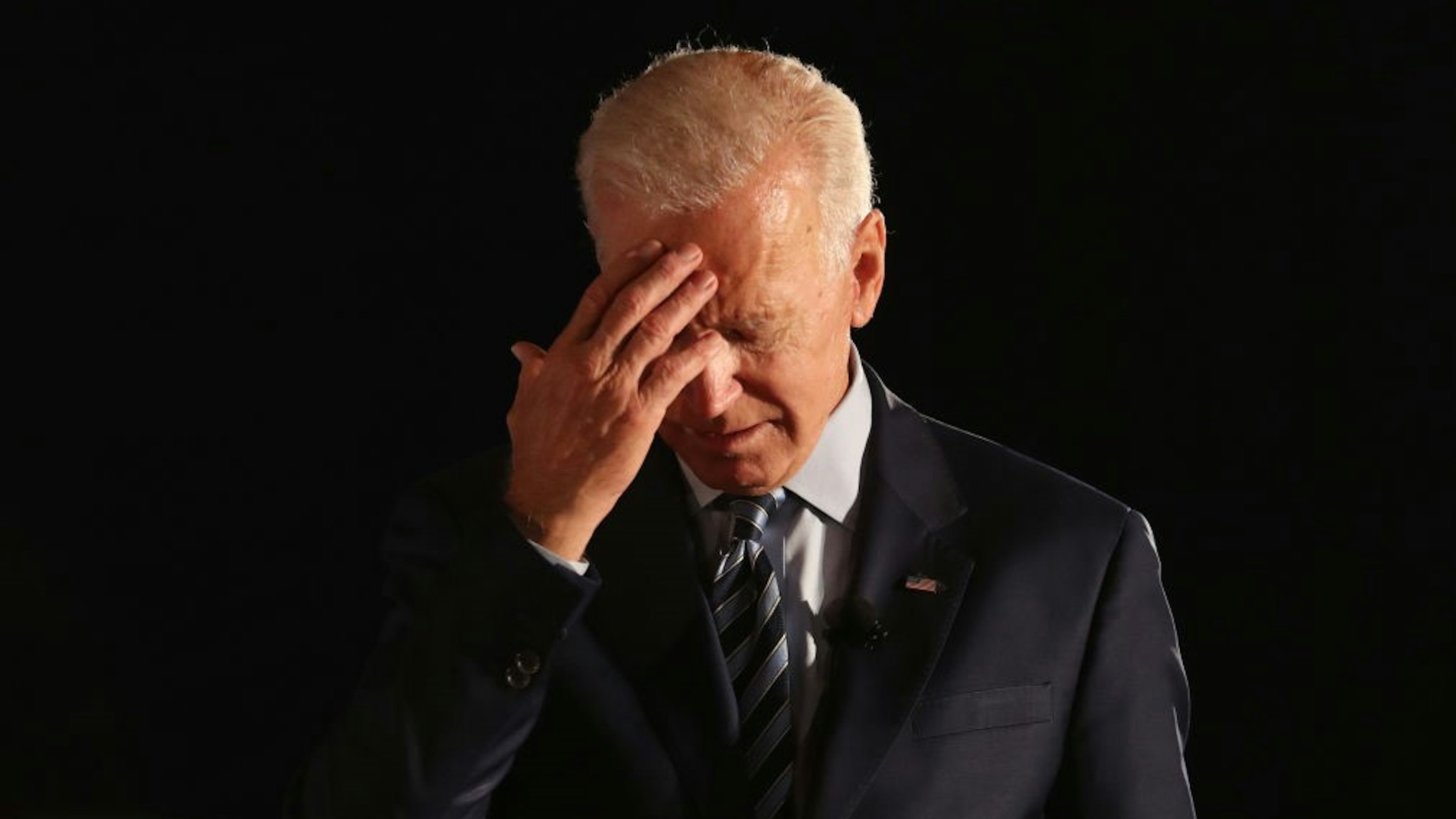 Democratic presidential candidate former U.S. Vice President Joe Biden pauses as he speaks during the AARP and The Des Moines Register Iowa Presidential Candidate Forum at Drake University on July 15, 2019 in Des Moines, Iowa. Twenty Democratic presidential candidates are participating in the forums that will feature four candidate per forum, to be held in cities across Iowa over five days. (Photo by