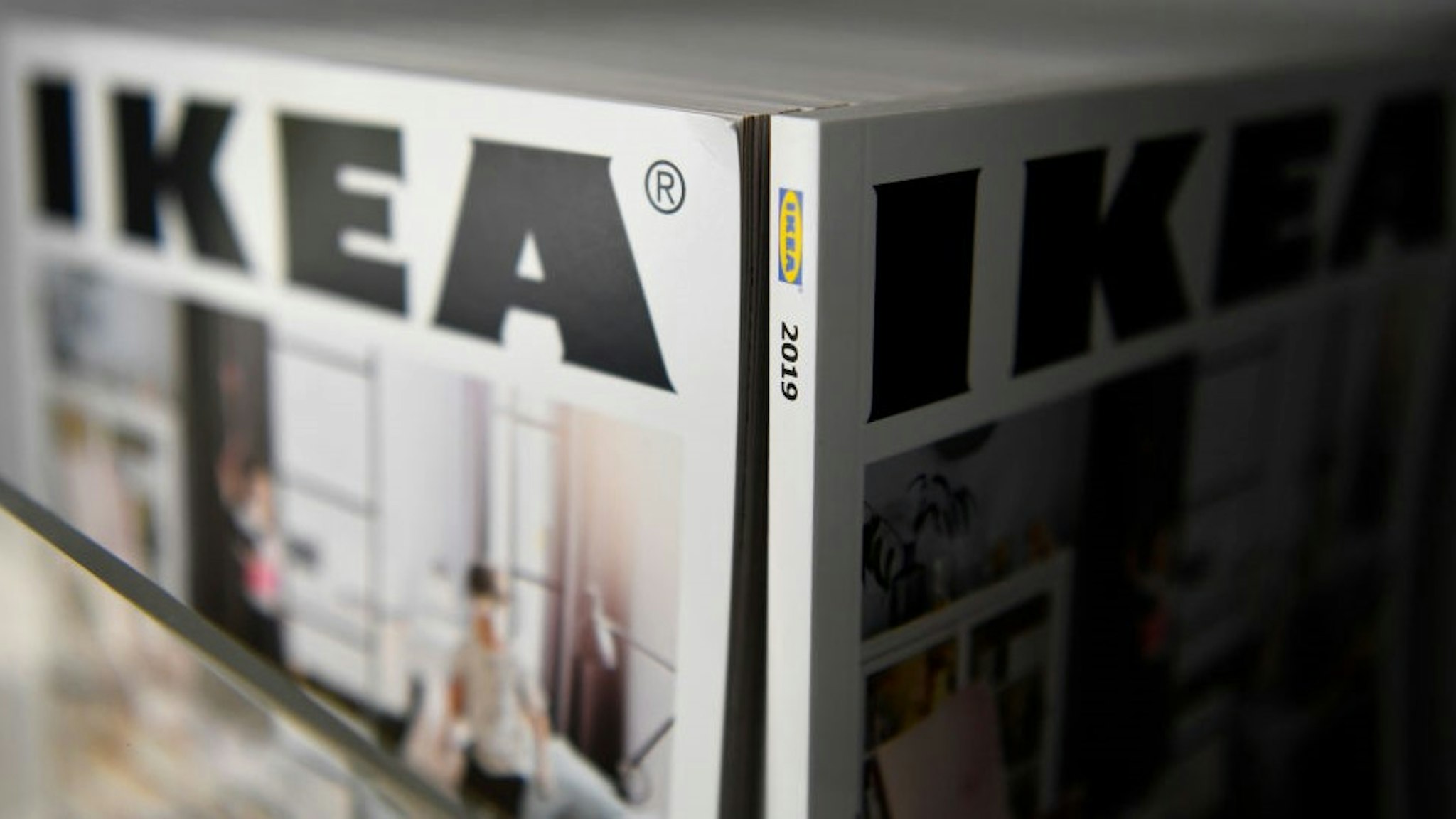 Catalogues are displayed at a store of the Swedish furniture giant Ikea in Madrid city center on October 10, 2018. (Photo by GABRIEL BOUYS / AFP) (Photo credit should read