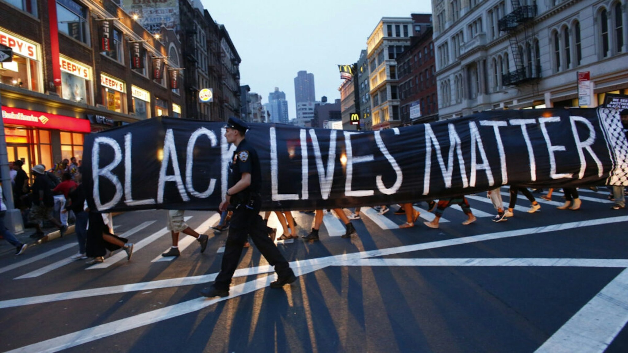 A police officer patrols during a protest in support of the Black lives matter movement in New York on July 09, 2016.