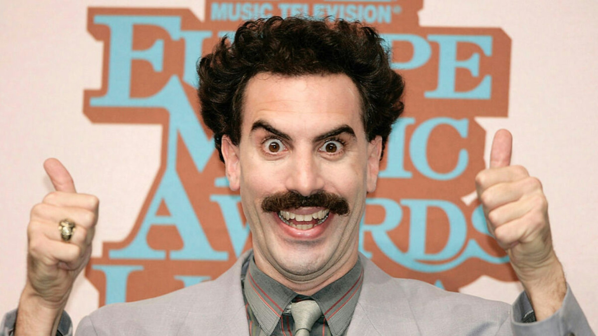 Presenter Sacha Baron Cohen playing the part of his comedy character "Borat" attends a photocall ahead of the 12th annual MTV Europe Music Awards 2005 at the Atlantic Pavilion on November 2, 2005 in Lisbon, Portugal.